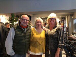 1 From left to right Peter Claxton EBIKE Cafe Owner Kim Newstead Chair of All Saints CE Academy PTA Josephine Parker EBIKE Cafe Owner Locals turn out to celebrate Ebike Cafe @ Deheers' first year of trading