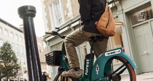 Forest bike riding outside cafe Forest Flex tops 10,000 rides a day as Londoners switch to e-bikes