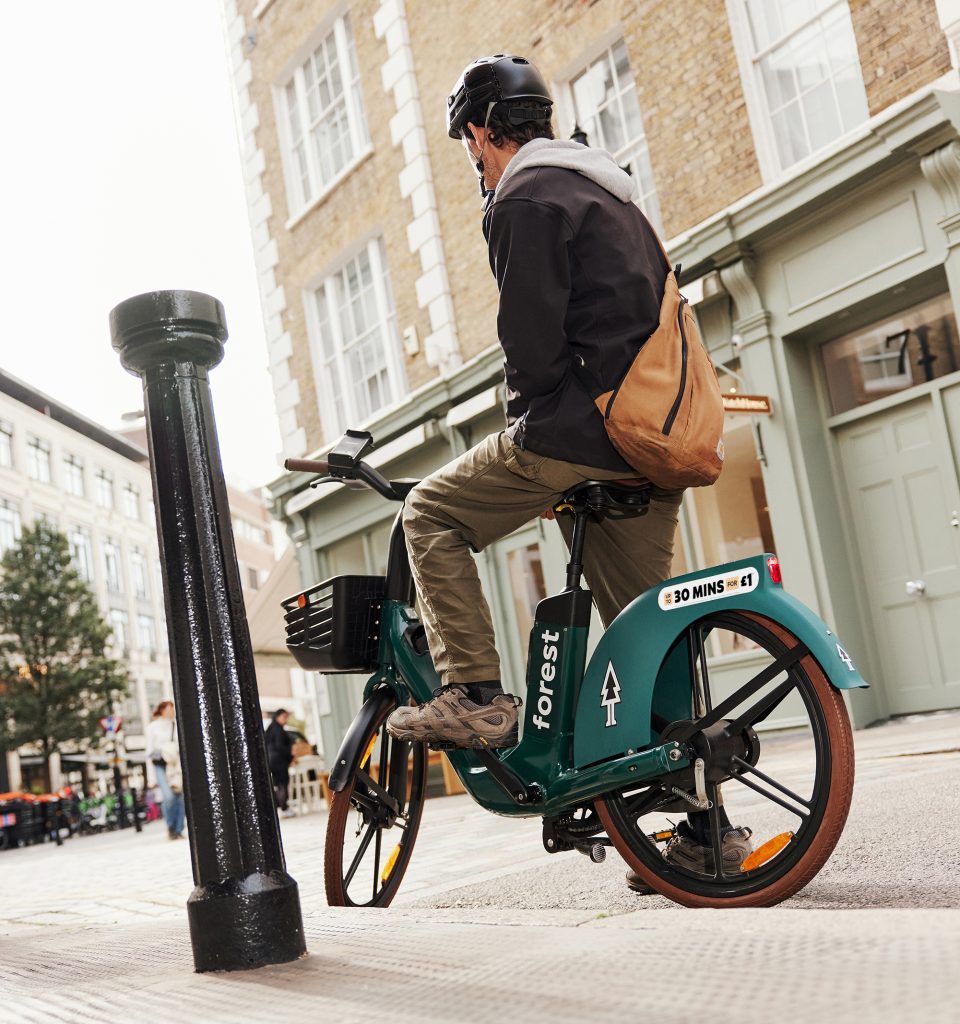 Forest bike riding outside cafe Forest pilots new subscription model as demand for service grows in London