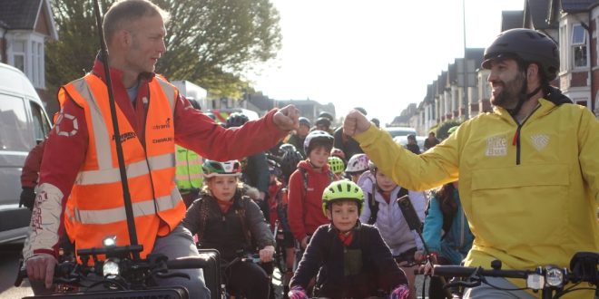 Hamish Belding and Coach Balto lead the Bike Bus. Credit Tom Hughes Sustrans Hundreds of children ride to school as part of biggest ever ‘FRideDays Bike Bus’
